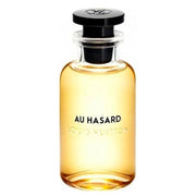 Au Hasard Louis Vuitton fragrance bottle for men on white background.