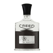 Aventus Creed for men decant fragrance samples, transparent bottle with black cap, elegant design.