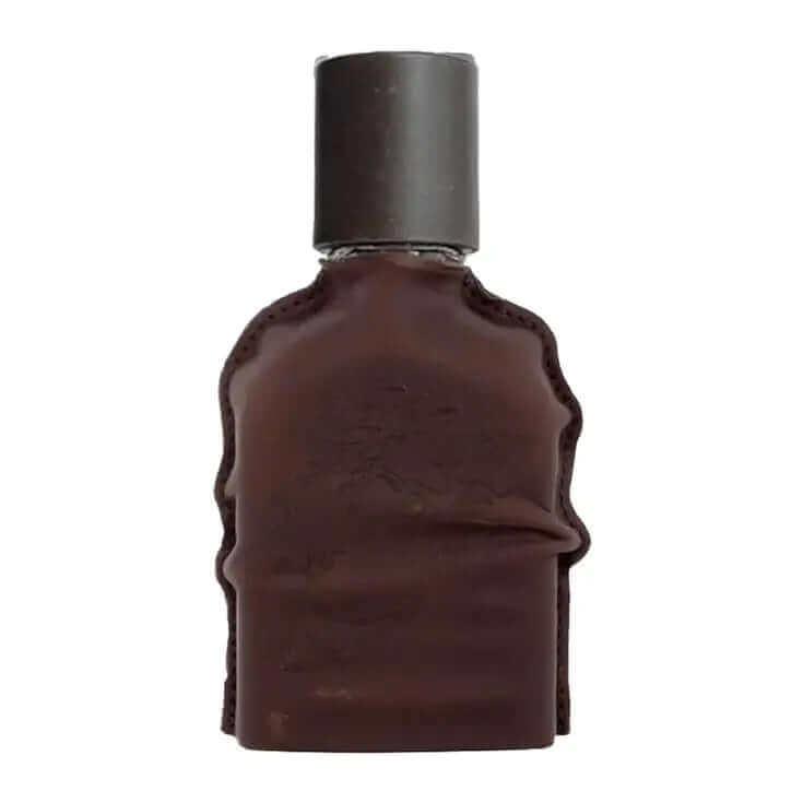 Cuoium Orto Parisi fragrance bottle with dark leather casing and black cap.