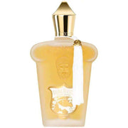 Dama Bianca Xerjoff fragrance decant bottle for women with gold cap and white tassel.
