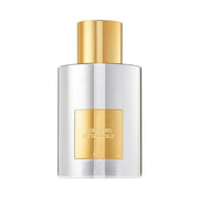 Metallique Tom Ford for women fragrance bottle with gold cap, sleek design.