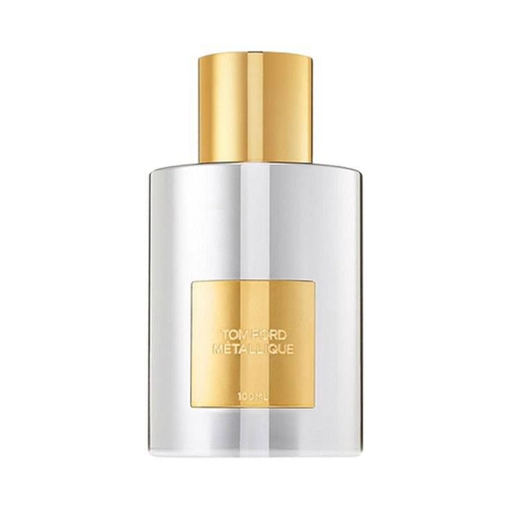 Metallique Tom Ford for women fragrance bottle with gold cap, sleek design.