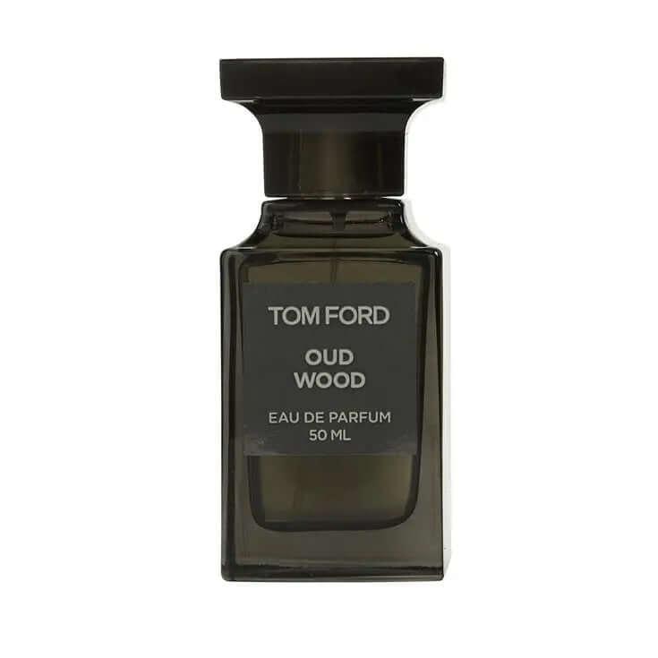 Tom Ford Oud Wood fragrance bottle against white background.